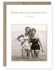 A vintage birthday card featuring two women standing in the sea, with the text 'Happy girls are the prettiest.'