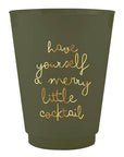 An olive green plastic cup featuring the phrase 'have yourself a merry little cocktail' printed in metallic gold cursive lettering, set against a plain white background.