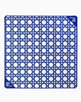 Blue and white geometric patterned mat with 'OH' branding on a white background