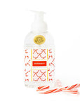 Foaming hand soap bottle with peppermint flavor on a white background