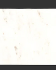 Two brown marble pumpkins inlaid in a long, narrow white marble board.