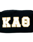 Black pouch with Kappa Alpha Theta in gold letters on a white background