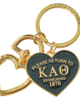 Gold and black keychain with 'Please Return to Kappa Alpha Theta' text on a white background