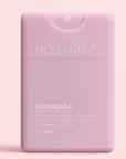 Pink hand sanitizer bottle with 'Noshinku' branding on a light pink background