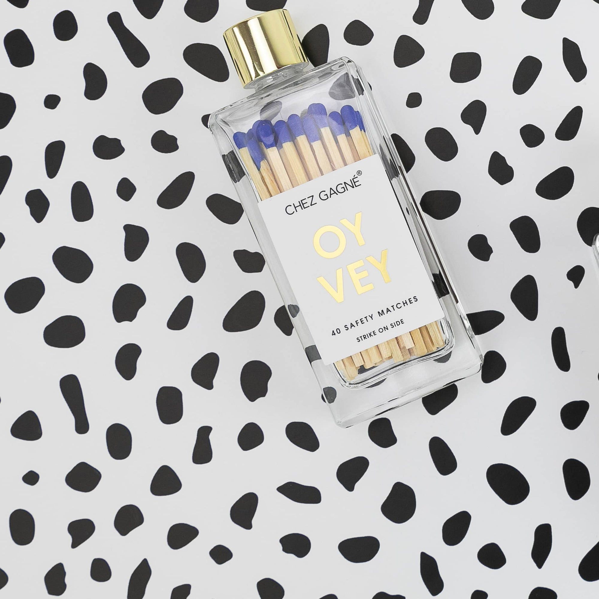  'OY Vey'  on a patterned background