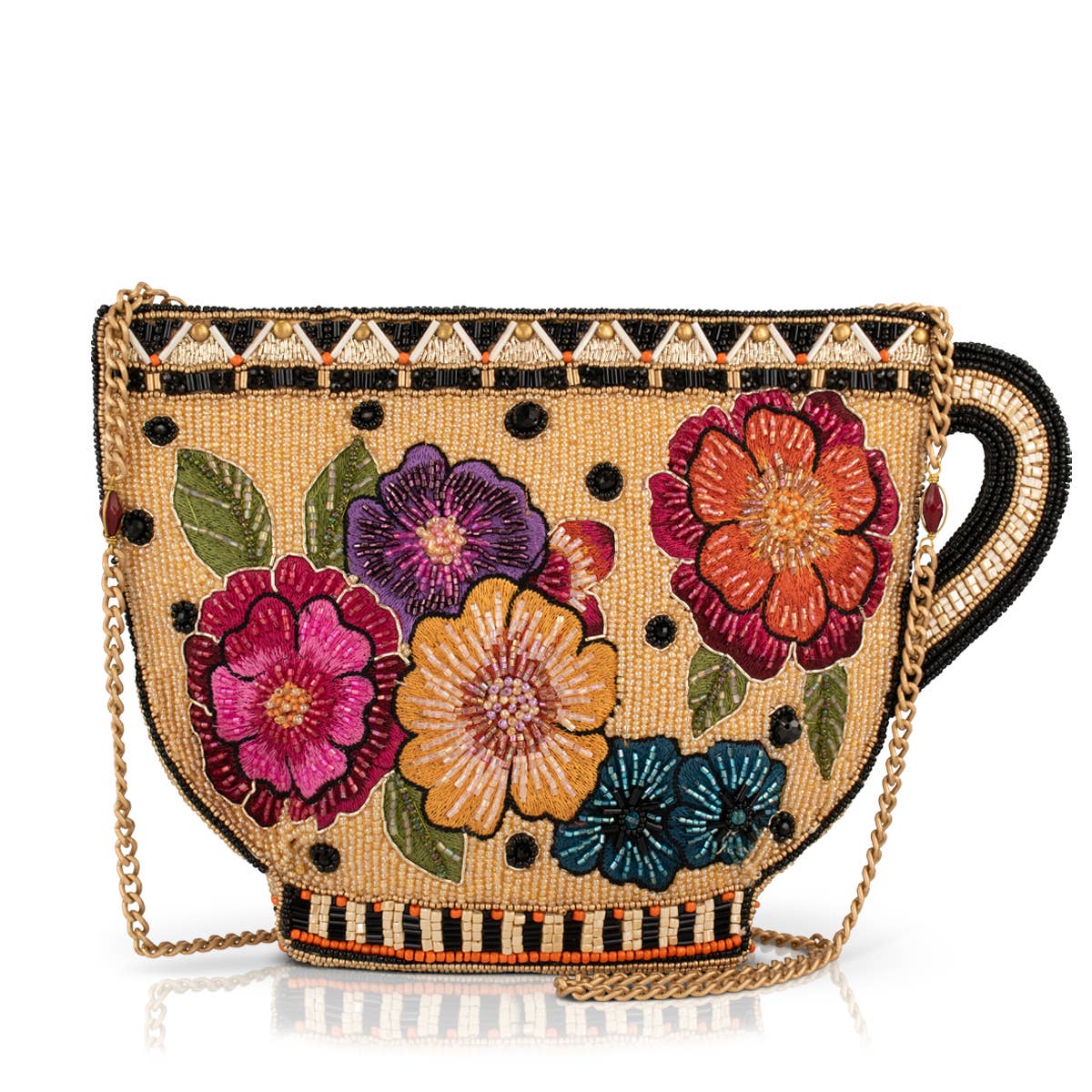 Woven handbag with floral designs and a gold chain on a white background