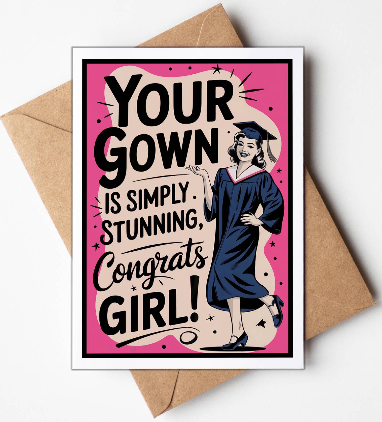 Graduation-themed card with a congratulatory message and a illustration of a graduate, placed on a brown envelope.