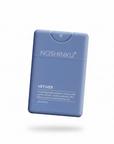 Blue hand sanitizer bottle with 'Noshinku' branding on a blue background