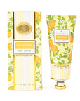 Hand cream with packaging featuring orange design on a white background