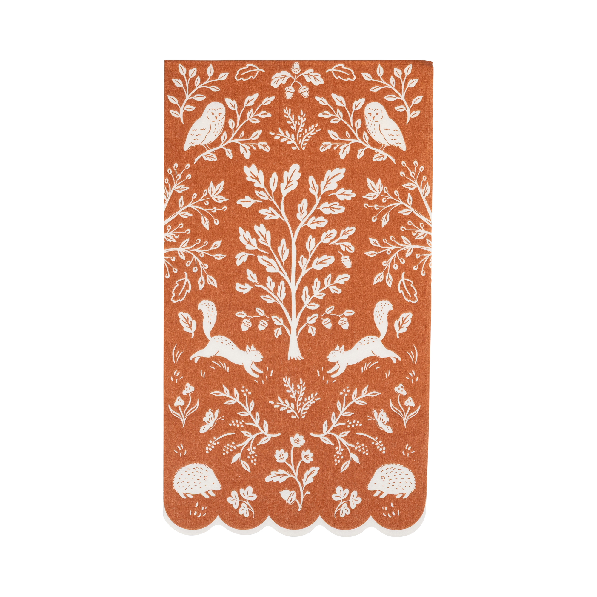 Dinner napkin with white forest pattern on a rust-colored background