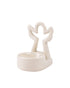 An off-white ceramic Angel tea light holder 