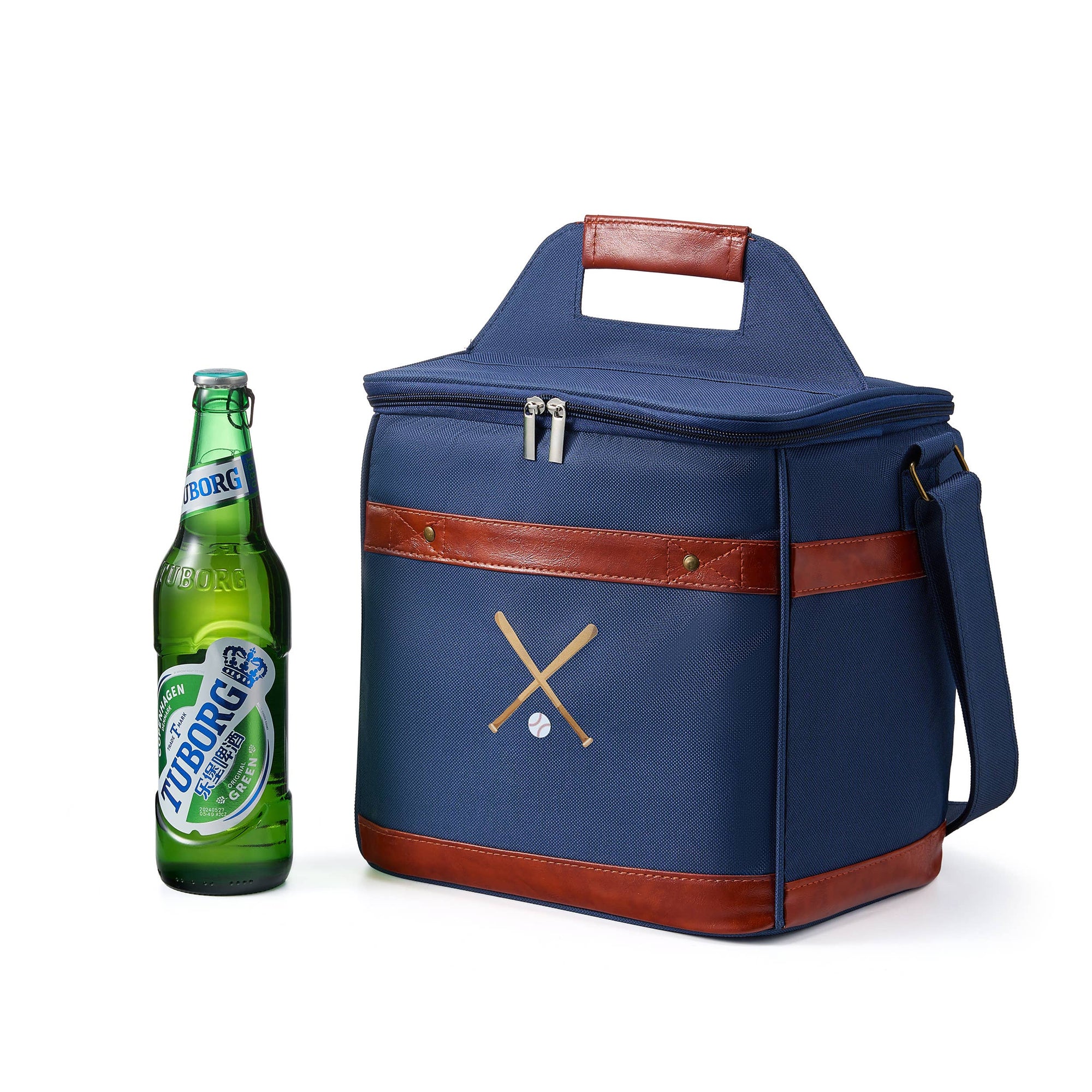 Blue cooler bag with brown leather accents next to a bottle of Peroni beer on a white background