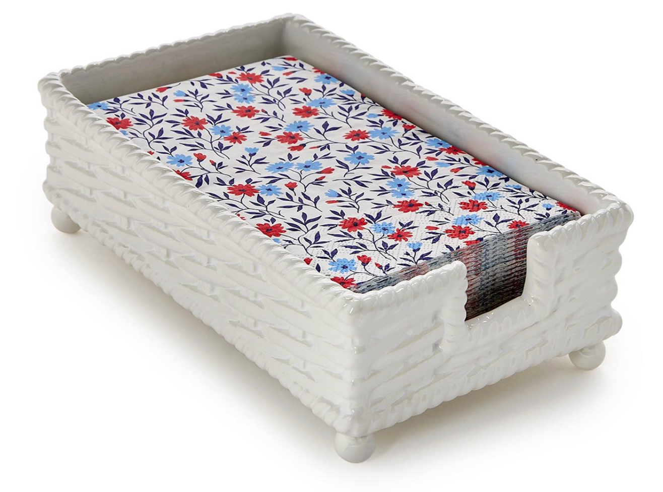 A white woven-texture rectangular tray or basket with a floral-patterned insert featuring red, blue, and navy flowers on a white background, shown on a light gray studio background.