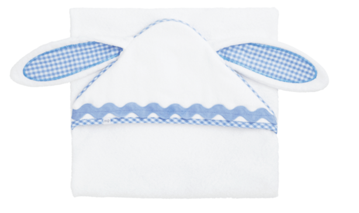 White baby outfit with blue checkered details on a white background