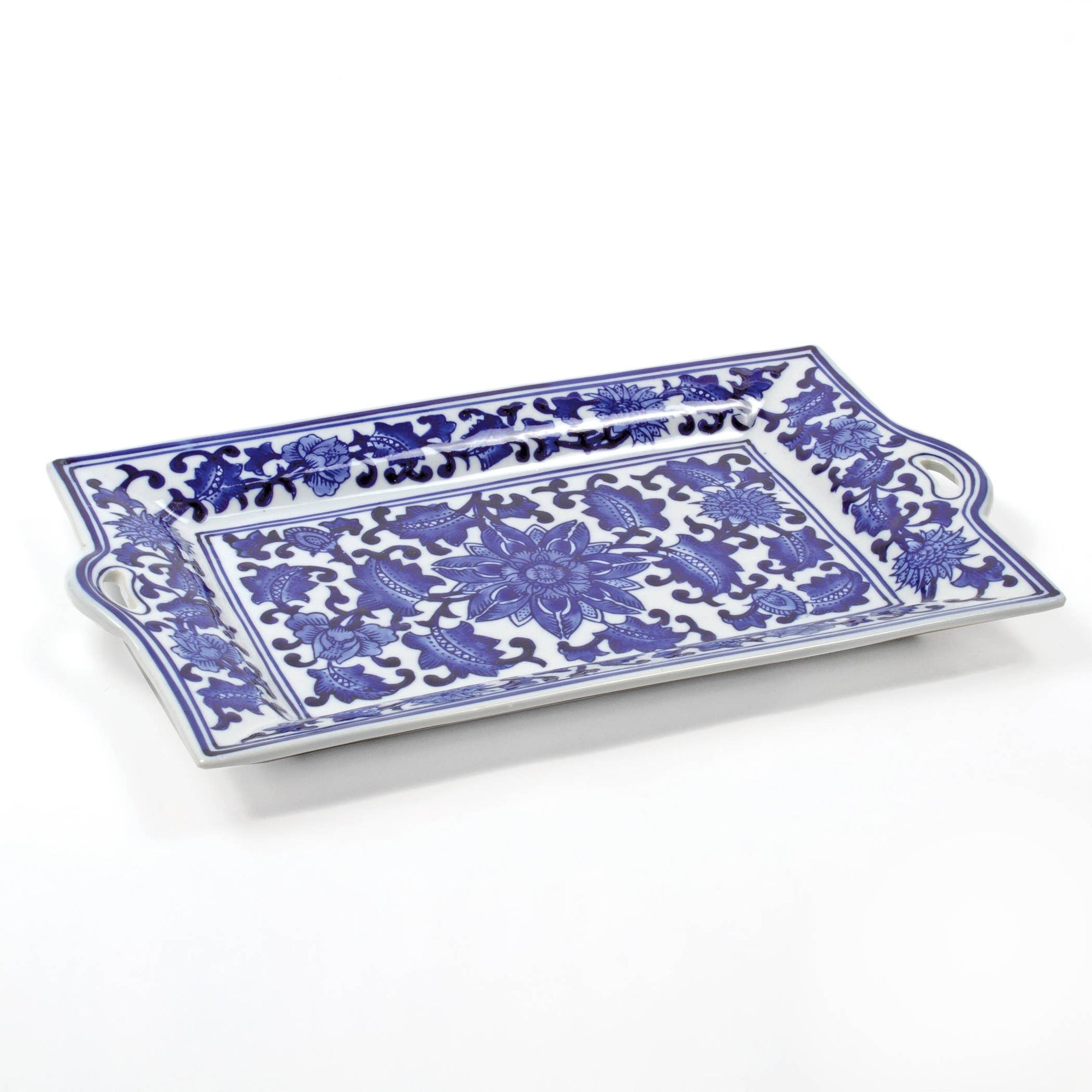 A rectangular blue and white porcelain tray with a floral pattern.