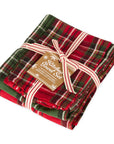 Folded plaid kitchen towel set with a label on a white background