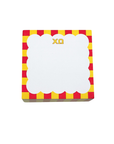 Notepad with red and yellow striped border and 'XO' logo on a white background
