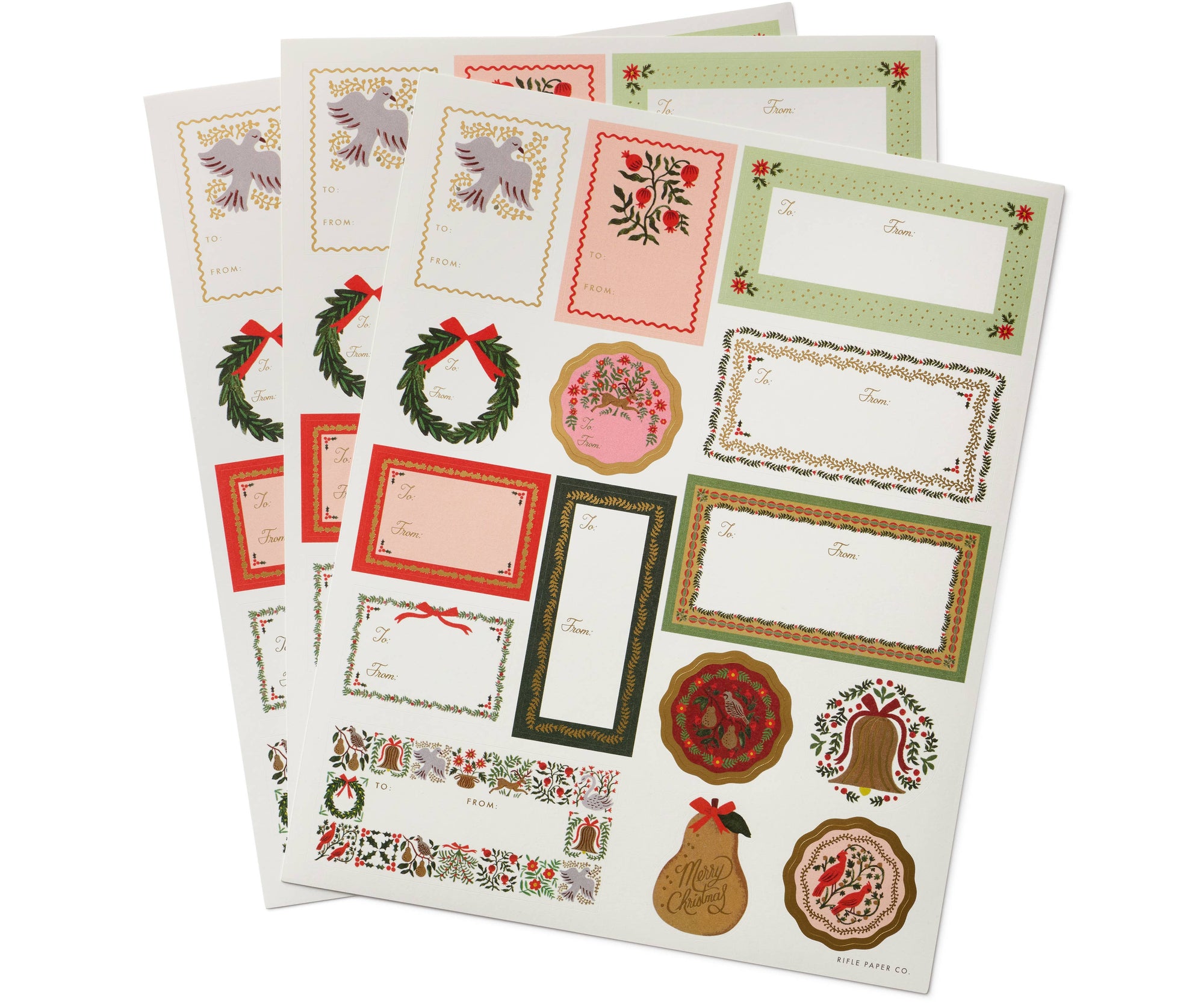 Three sheets of Christmas-themed decorative labels and stickers fanned out on a white background, featuring holiday designs like wreaths, bells, gingerbread men, and festive frames.
