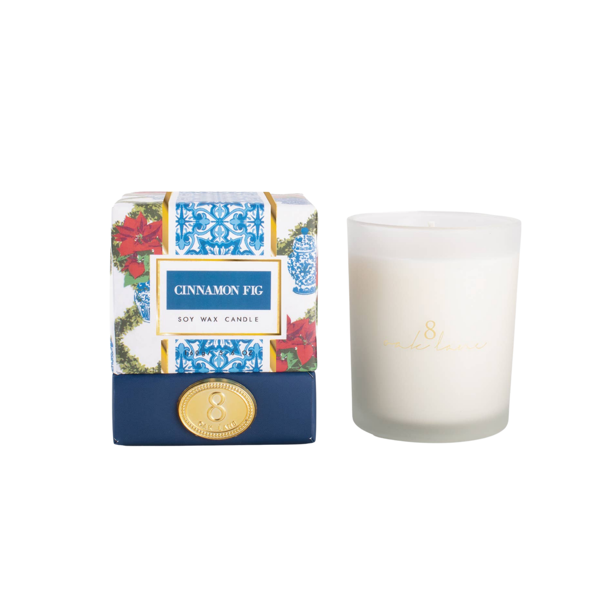 Cinnamon Fig candle with decorative box on a white background