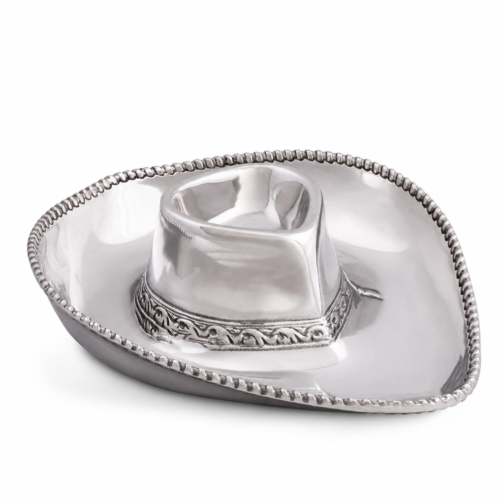 A silver-plated metal cowboy-shaped serving dish with a decorative beaded rim and embossed band detail, shown on a plain white background.