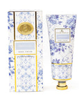 Hand cream with floral packaging on a white background