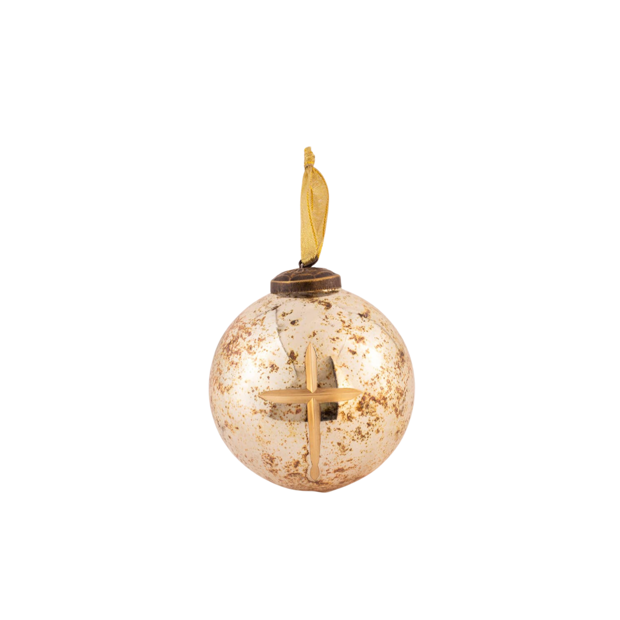 Decorative glass ball with a gold cross and feather on a white background