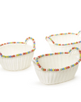 Three round faux wicker baskets with multi-color wood bead trim, in varying sizes, against a white background.