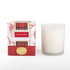 A 'Festive Spice' soy wax candle shown next to its retail packaging box. The candle is in a frosted glass jar with gold branding, and the box features a red and white plaid pattern with red floral accents and a gold seal.