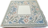 A Mahjong mat featuring a classic Arts and Crafts style border with blue leaves, pink flowers, and brown birds on a white background.