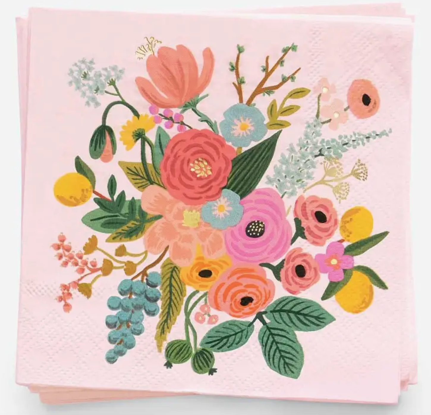 A stack of light pink paper napkins featuring a colorful floral illustration with pink, orange, yellow, blue, and green flowers and leaves on a white background.