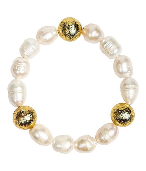 Pearl bracelet with gold beads on a white background