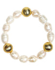 Pearl bracelet with gold beads on a white background