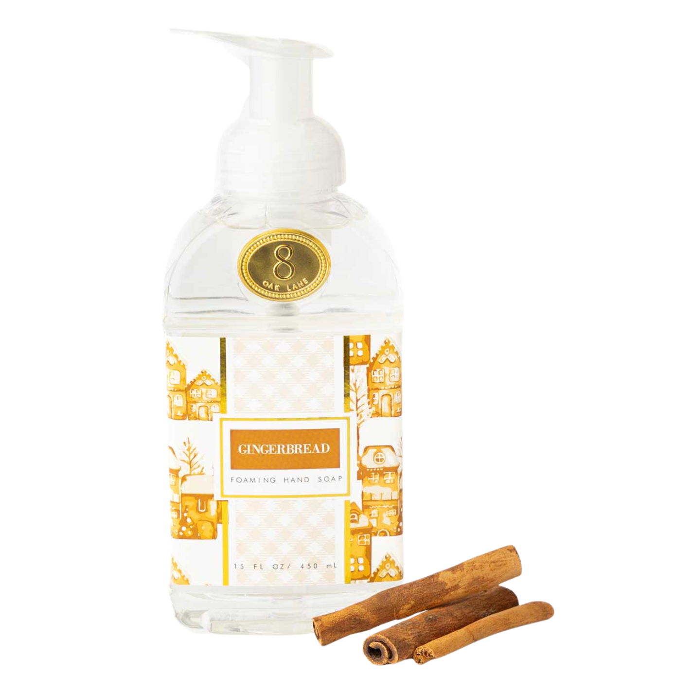 Bottle of 'Gingerbread' soap with two cinnamon sticks on a white background