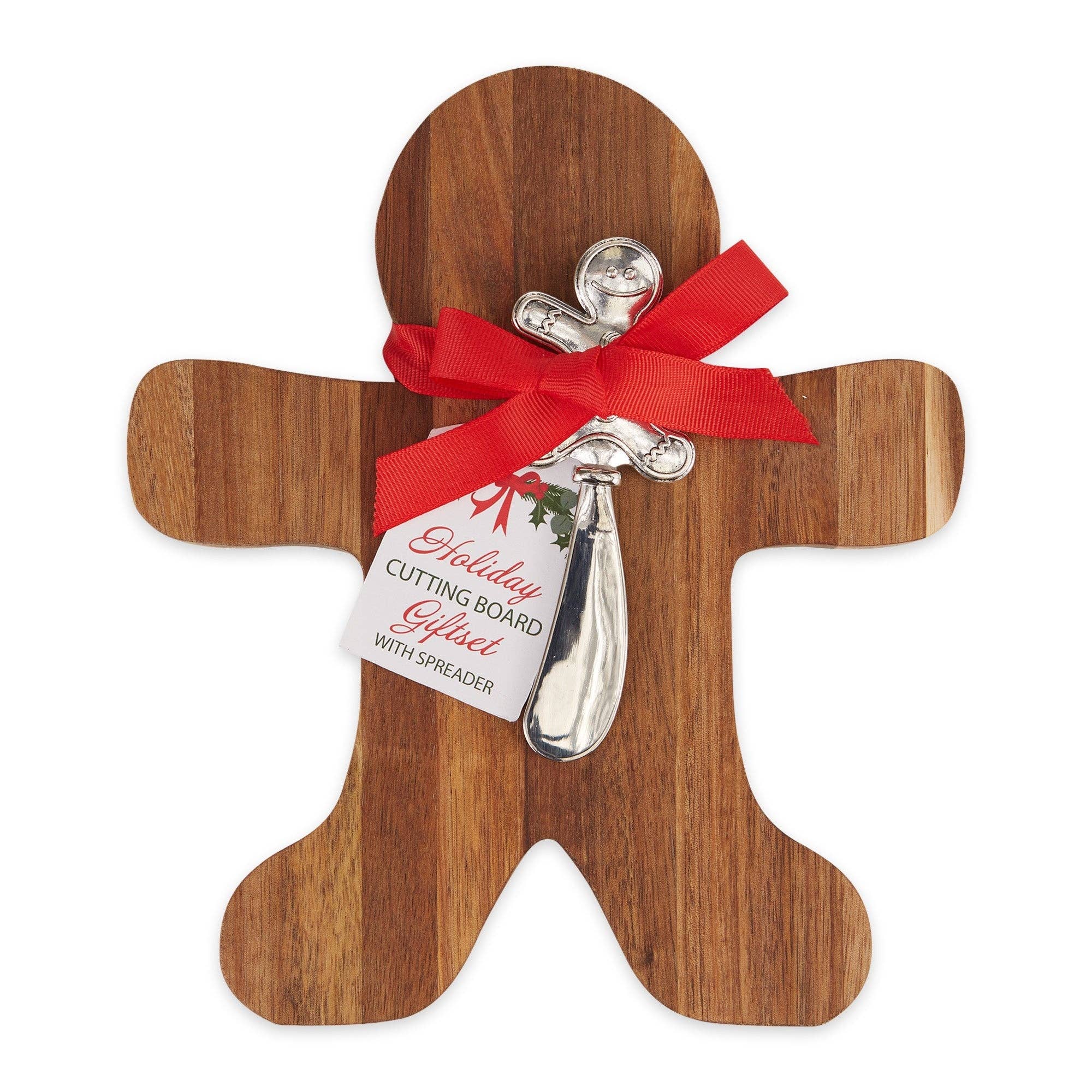 A gingerbread man shaped wooden cutting board gift set on a white background, featuring a silver metal holiday spreading tool tied with a red ribbon and a gift tag that reads 'Holiday CUTTING BOARD GIFT WITH SPREADER'.