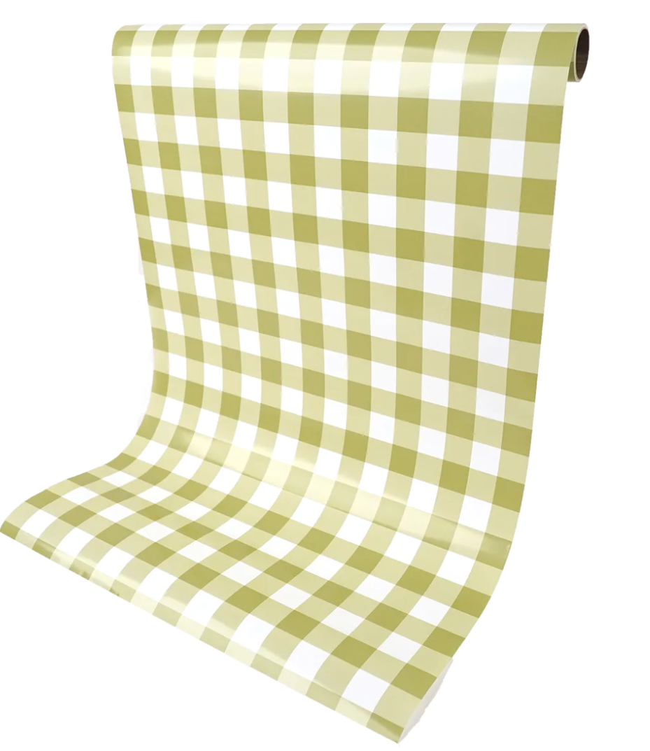 A paper table runner with a gingham pattern in olive green and white.