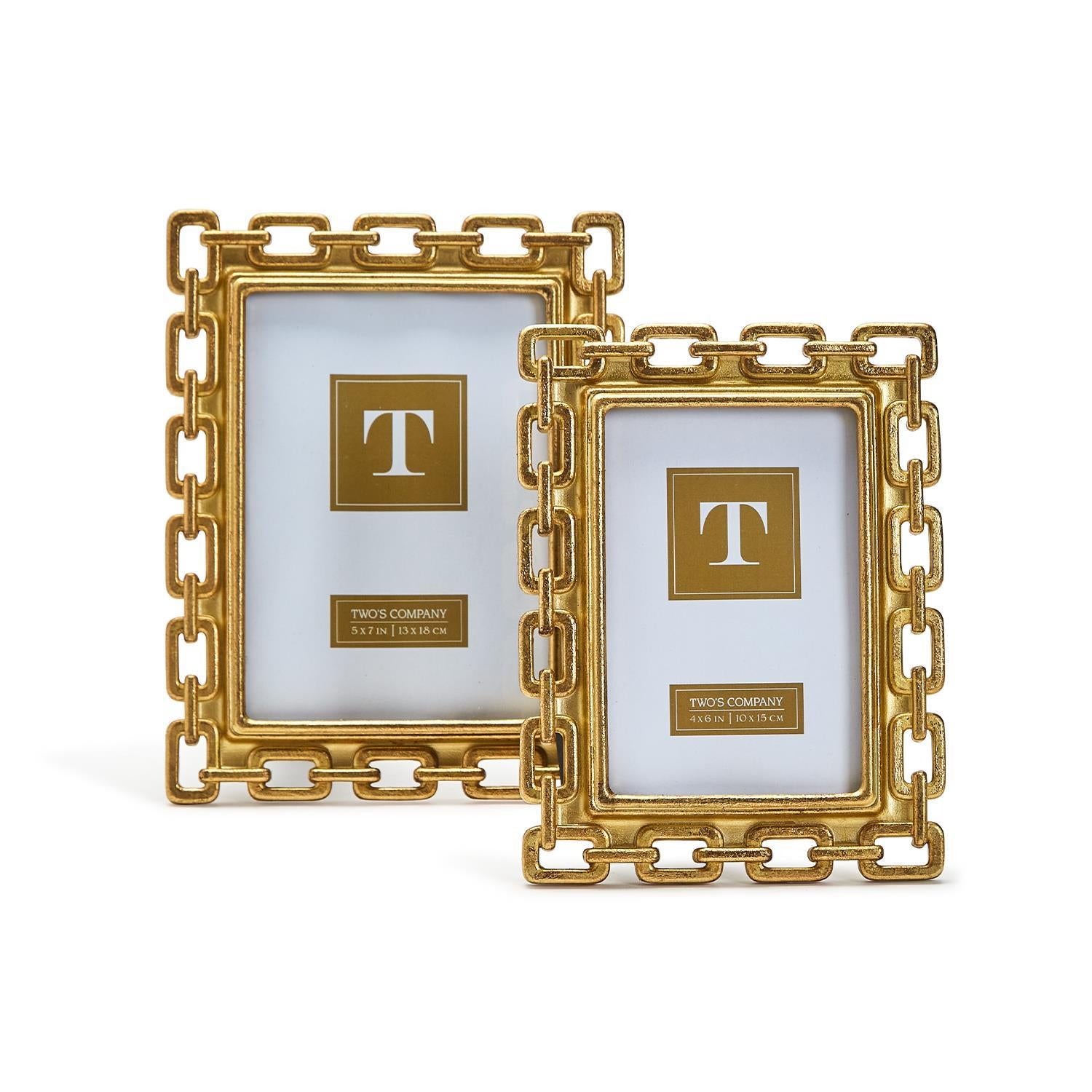 Two gold link picture frames on a white background