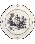 Decorative paper plate with black and white illustration of a castle and trees on a white background
