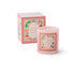Pink candle with decorative label and matching box on a white background