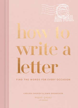 Book titled 'How to Write a Letter' with gold text on a pink background