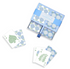 Set of playing cards with floral designs in a blue box on a white background