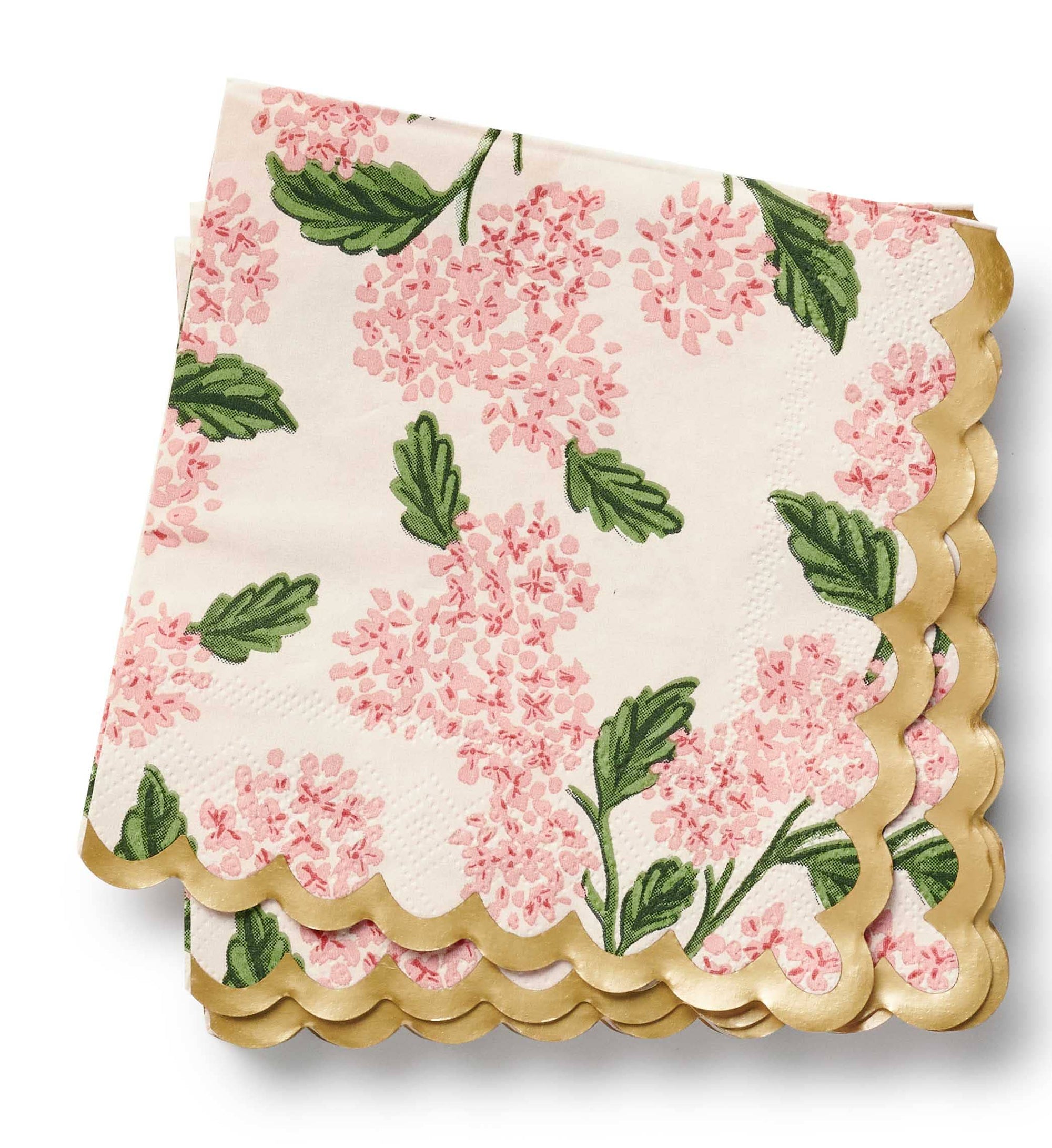Floral-patterned napkin with scalloped edge on a white background