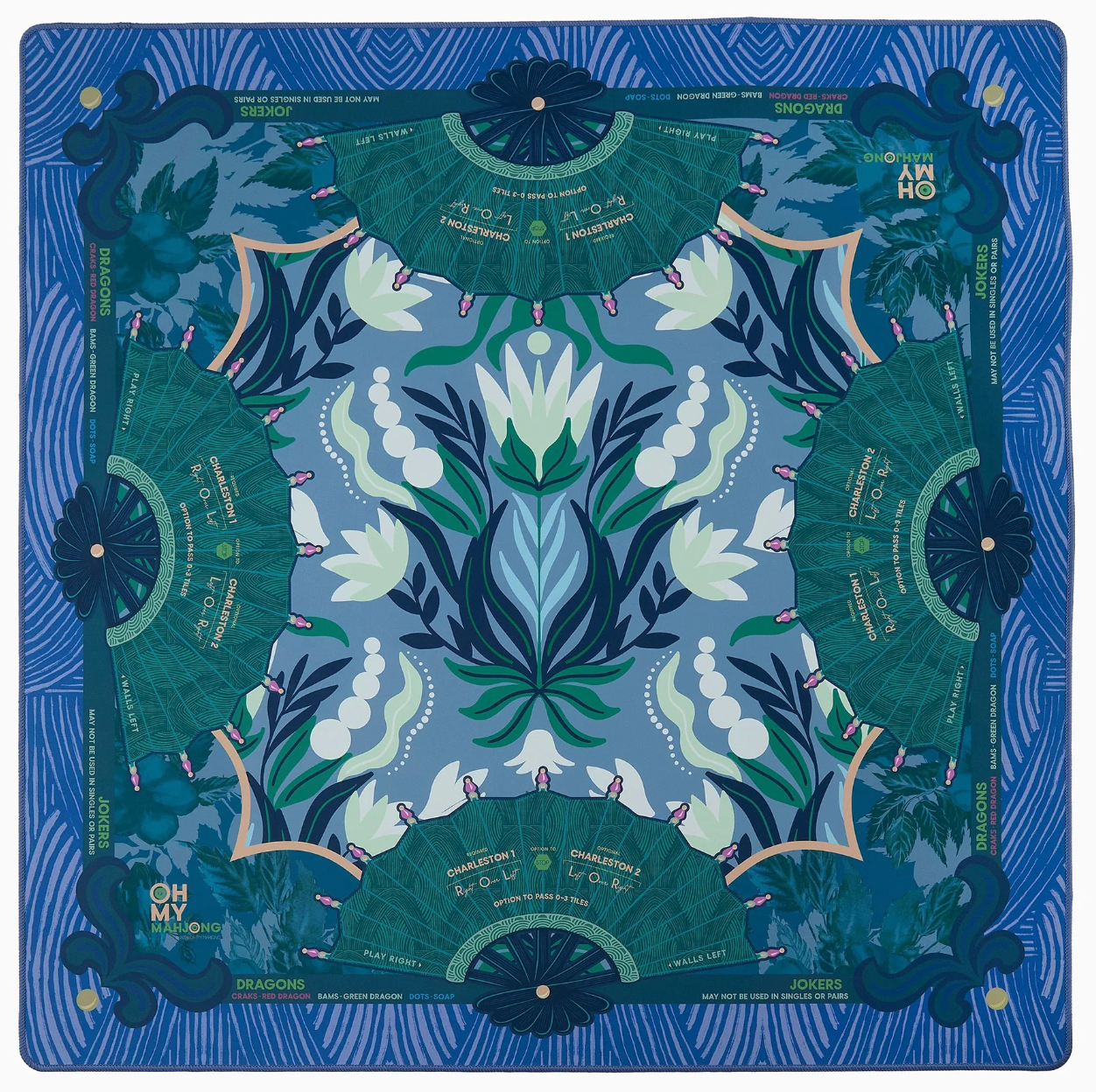 Decorative mat with floral and fan design on a blue background
