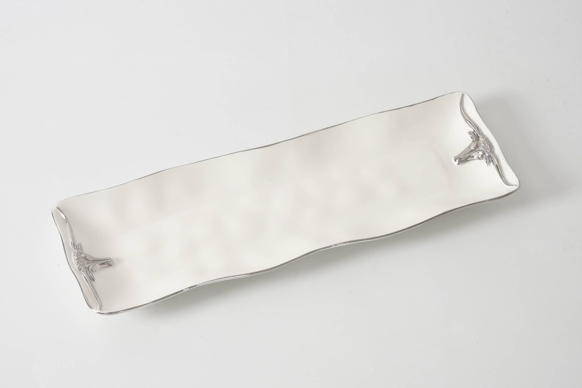 White ceramic tray with silver accents and silver Longhorn details