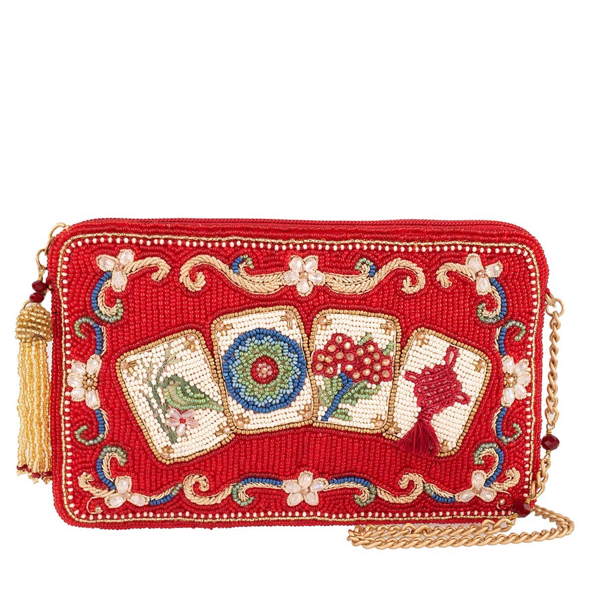 A red beaded clutch purse featuring embroidered playing card designs and gold-tone chain strap on a white background.