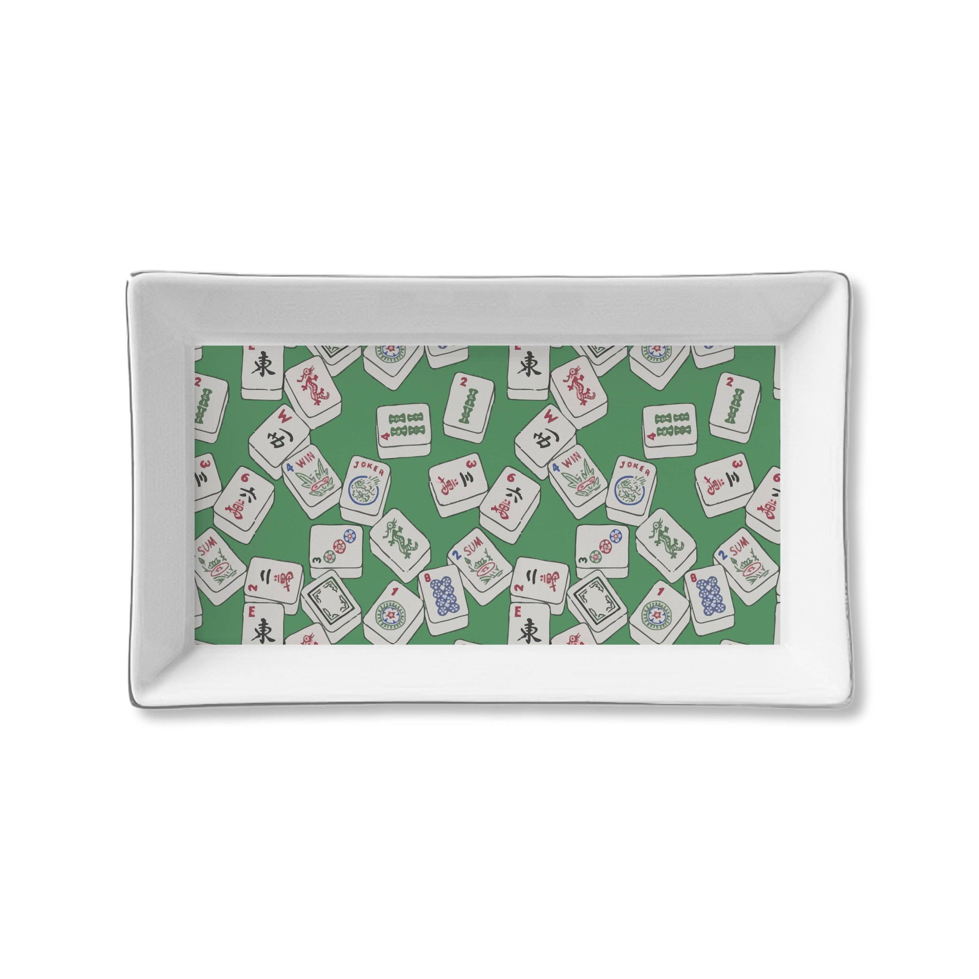 Rectangular white plate with a green background featuring a pattern of cards