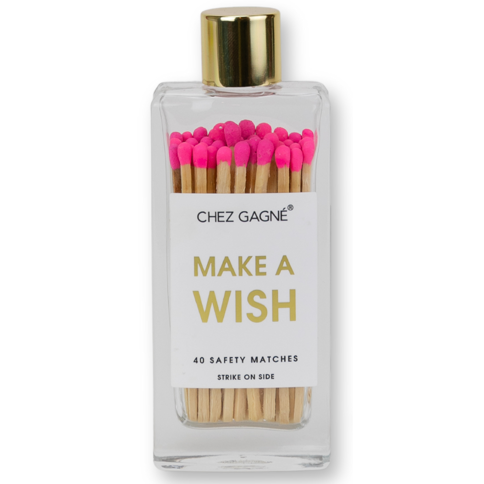 Matches with pink tips in a container labeled 'Make a Wish' by Chez Gagne on a white background.