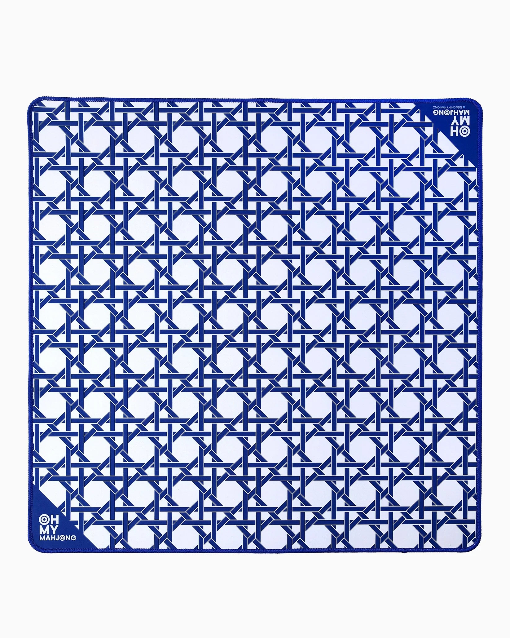 Blue and white geometric patterned mat with 'OH' branding on a white background