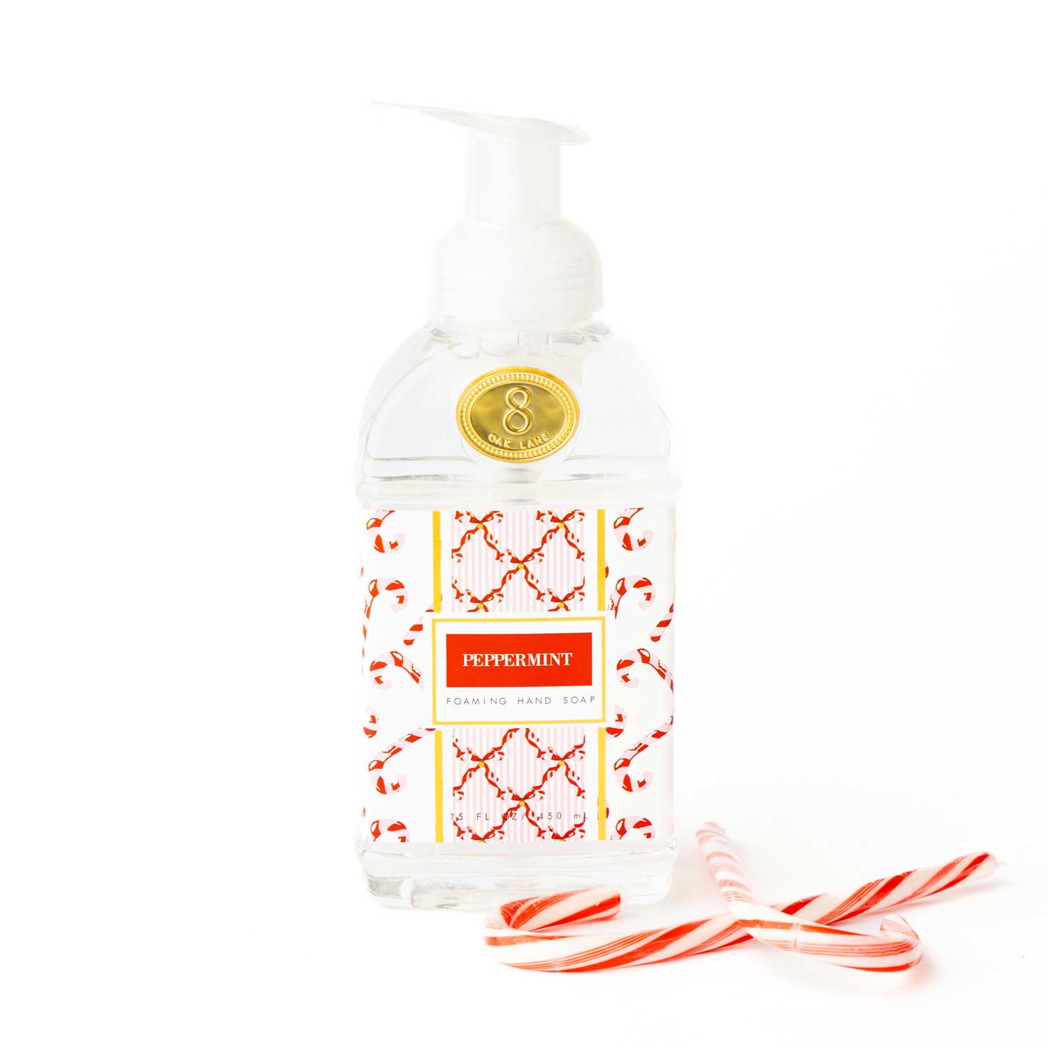 Foaming hand soap bottle with peppermint flavor on a white background