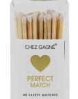 A clear rectangular bottle of Chez Gagné Perfect Match safety matches with a gold cap and white label, showing wooden matches inside.