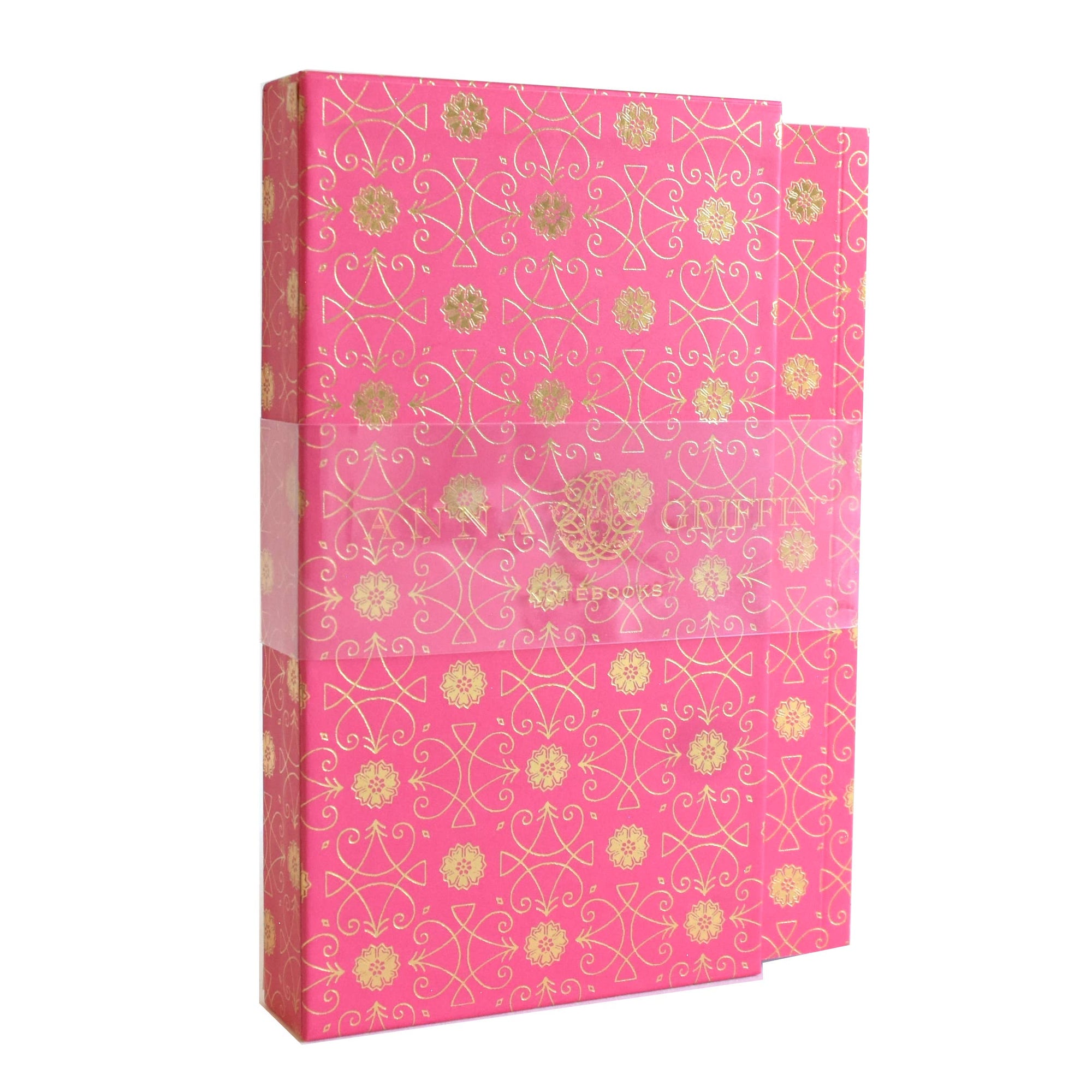 Pink with gold foil box that contains notebooks